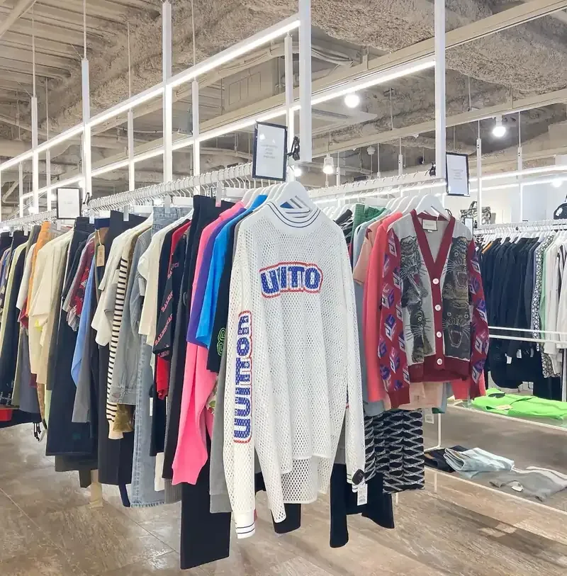 Thrift store in Osaka with racks of vintage and second-hand clothing on display.