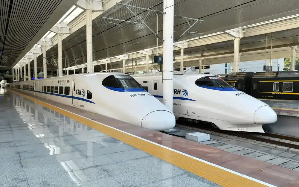Two CRH high-speed trains at station