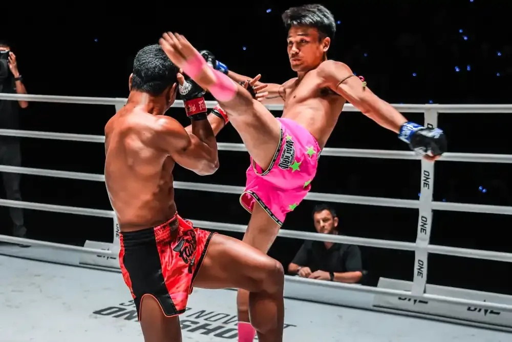 Muay Thai kickboxing bout  ￼