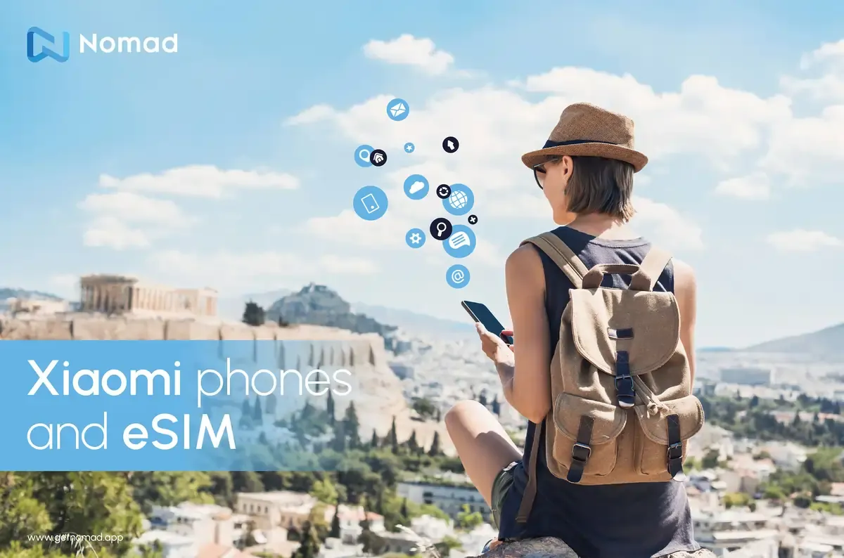 Traveler holding a Xiaomi phone in a mountainous cityscape, demonstrating how to use an eSIM on Xiaomi devices.