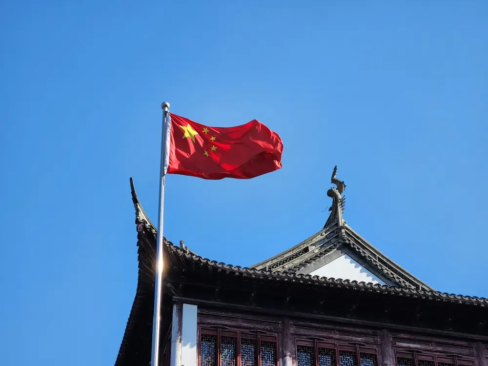 China flag on display on a windy day