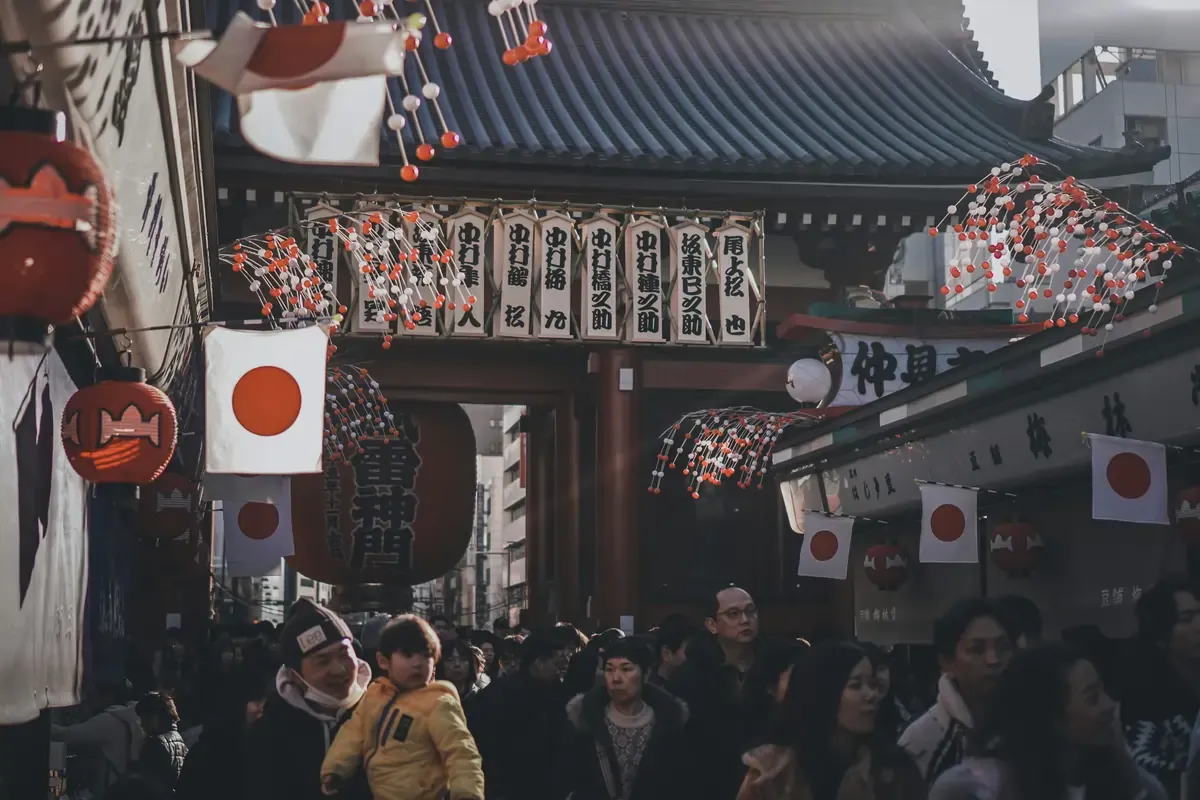 People in Japan shopping along a tourist district