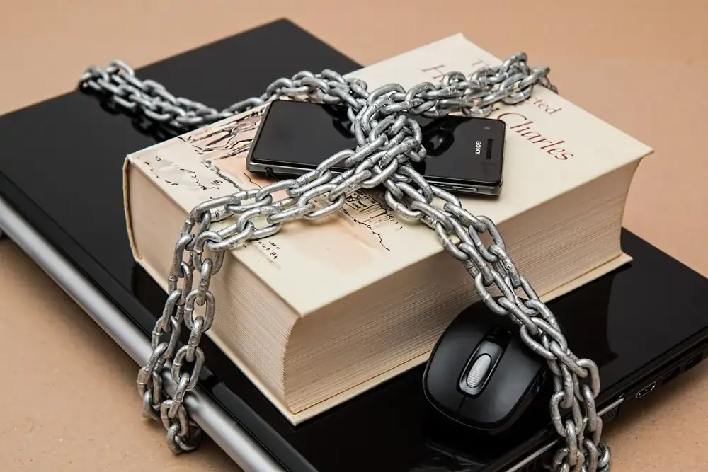 Chained devices symbolising eSIM tracking and security concerns