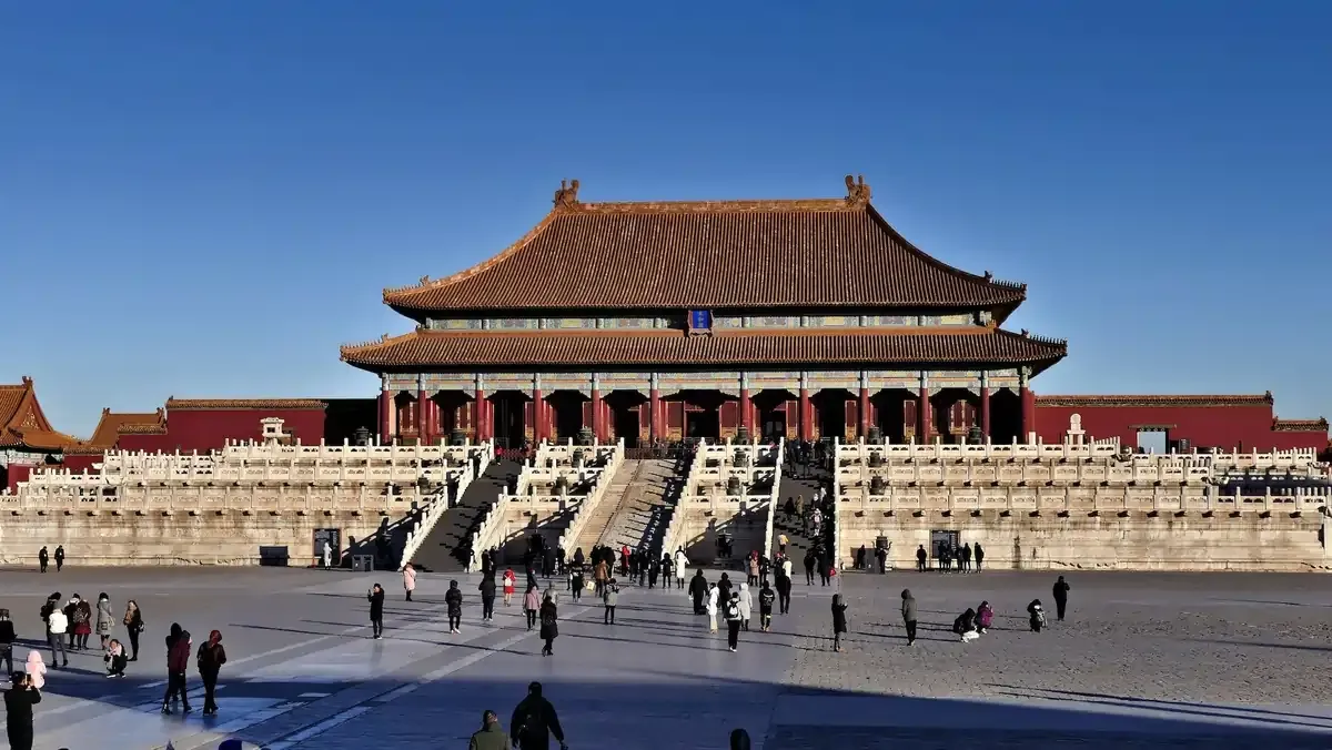 Tourists visiting the Hall of Supreme Harmony at the Forbidden City in Beijing, China